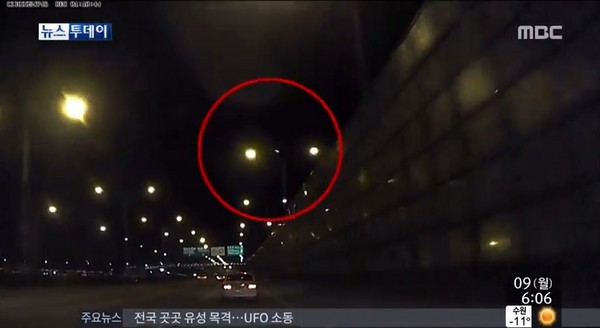 韩国首尔市区上空出现疑似飞碟的物体